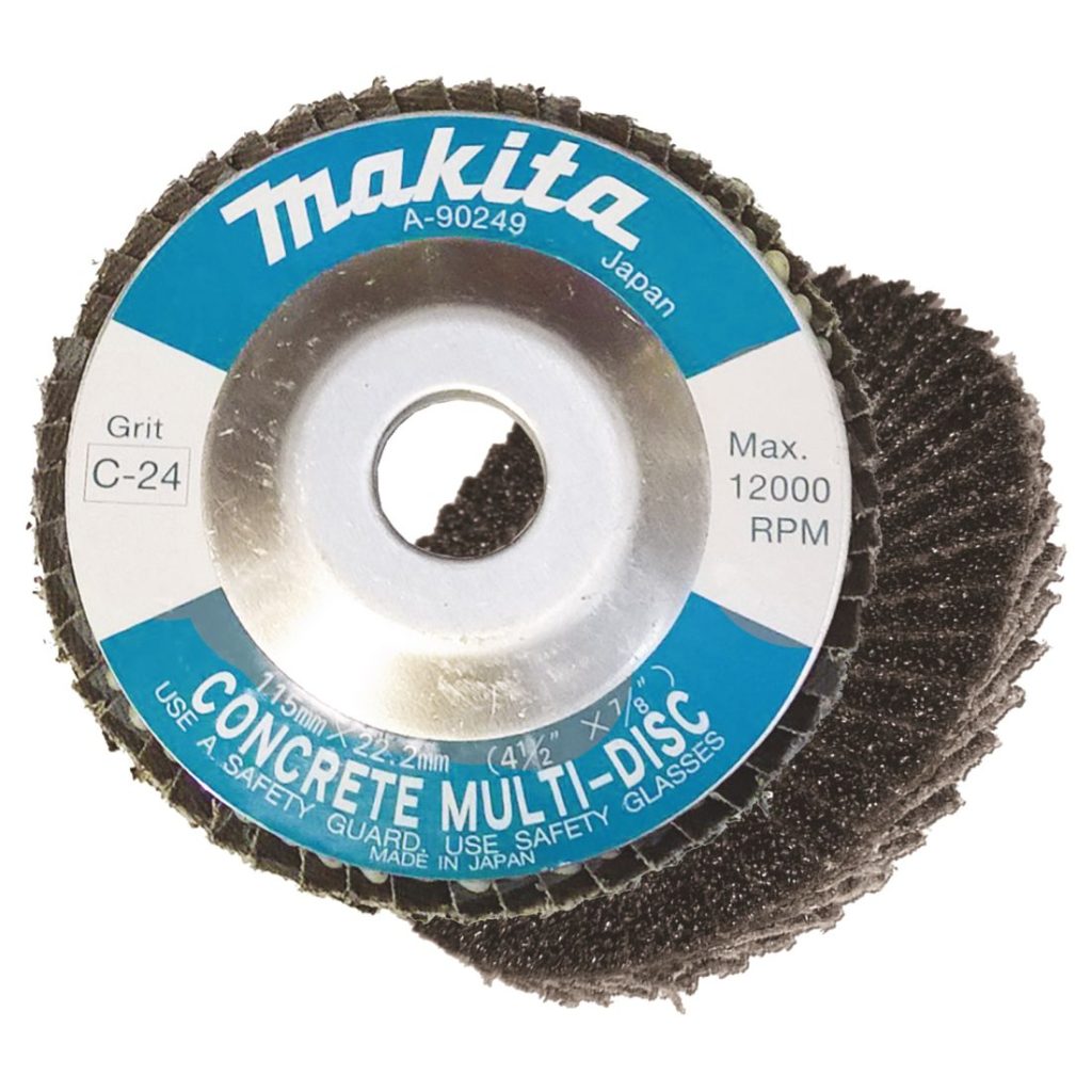 MAKITA Liuskalaikka 115mm k24 betonille. Kuvassa liuskalaikka ylhäältäpäin. Laikan takaa näkyy myös liuskalaikka alapuolelta.