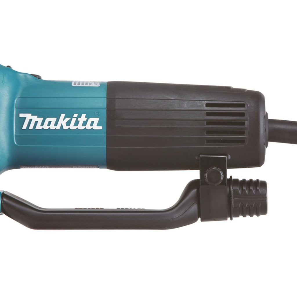 MAKITA Epäkeskohiomakone. Lähikuvassa epäkeskohiomakoneen kumisesta kädensijasta.