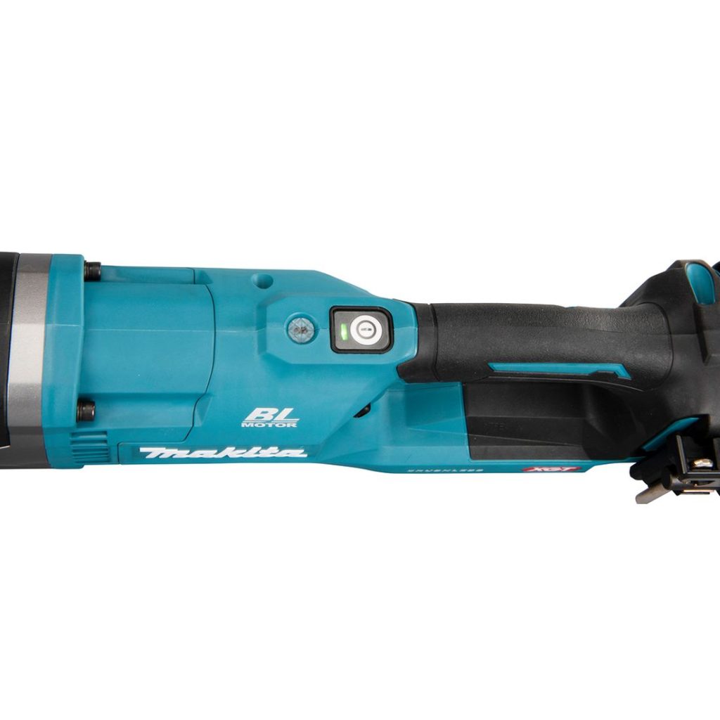 MAKITA Maakairakone XGT. Lähikuvassa Maakairakone XGT:n käyttökytkin.
