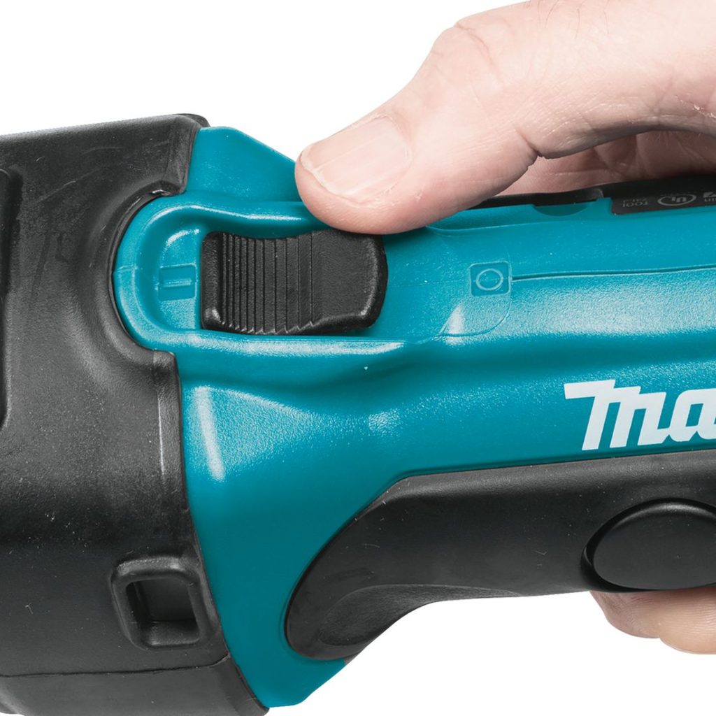 MAKITA Suorahiomakone LXT. Kuvassa Suorahiomakone LXT:n käyttökytkimestä.