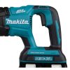 MAKITA Puukkosaha LXT. Lähikuvassa Puukkosaha LXT:n kädensija vasemmalta sivustapäin.
