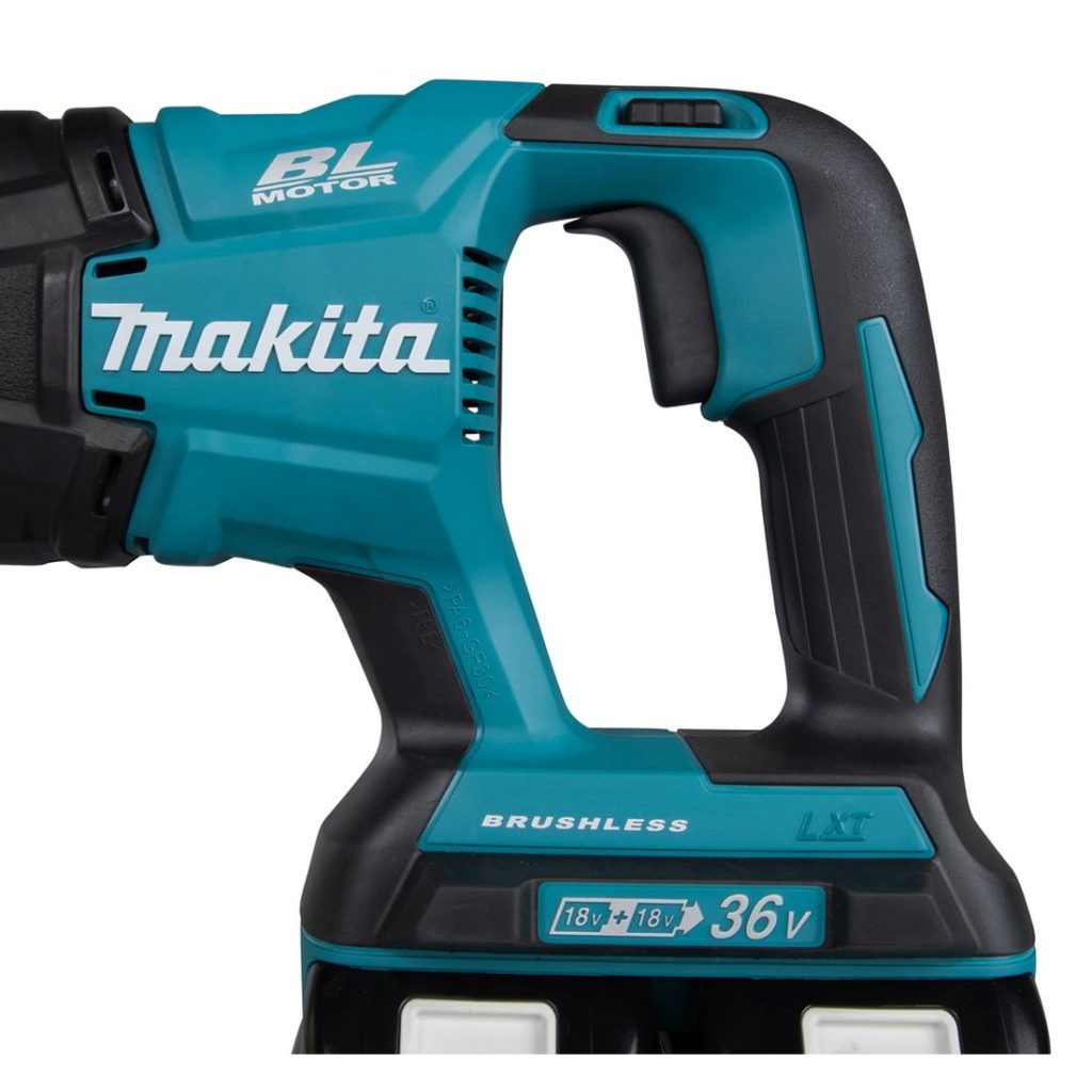 MAKITA Puukkosaha LXT. Lähikuvassa Puukkosaha LXT:n kädensija vasemmalta sivustapäin.