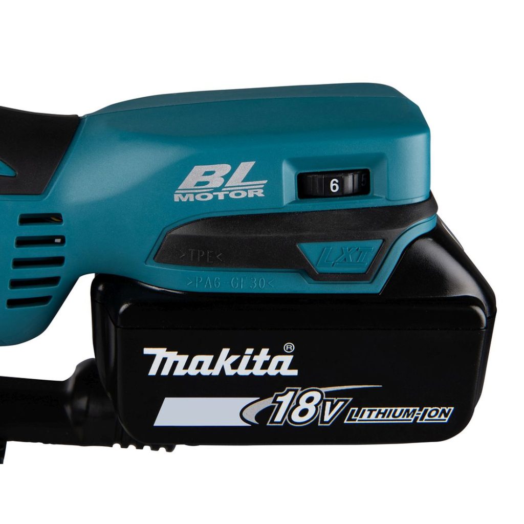 MAKITA Pistosaha LXT. Lähikuvassa Pistosaha LXT:n portaaton nopeudedsäädin.