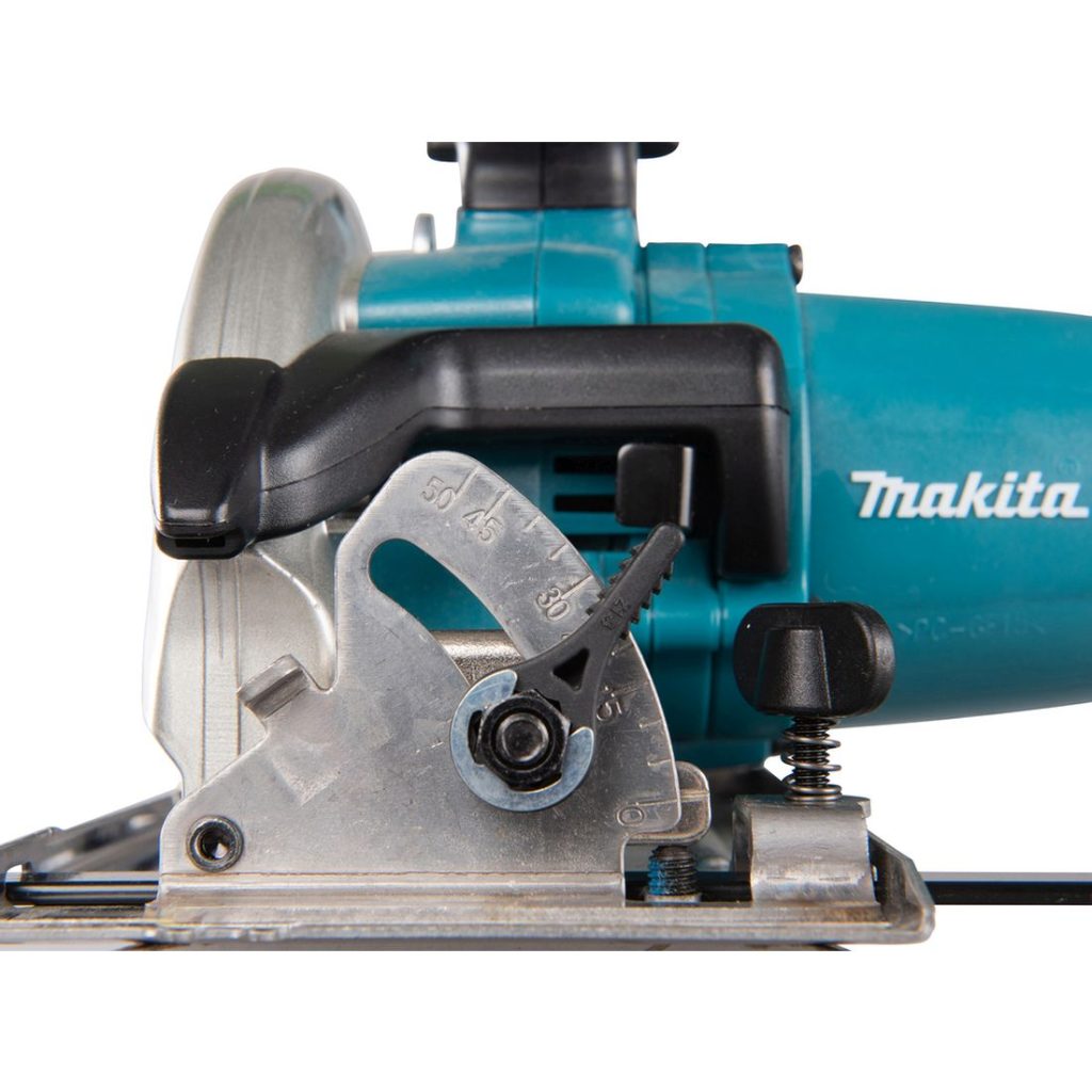 MAKITA Pyörösaha LXT. Lähikuvassa Pyörösaha LXT:n kallistuksen säädin.