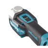 MAKITA Monitoimikone LXT. Lähikuvassa Monitoimikone LXT:n käynnistyskytkin vasemmalta takayläviistosta.