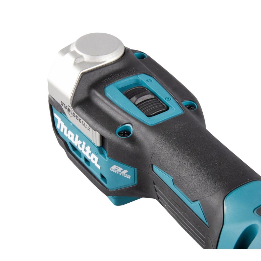 MAKITA Monitoimikone LXT. Lähikuvassa Monitoimikone LXT:n käynnistyskytkin vasemmalta takayläviistosta.