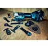 MAKITA Monitoimikone LXT. Kuvassa Monitoimikone LXT sekä erilaisia upotusteriä ja hiomateriä.
