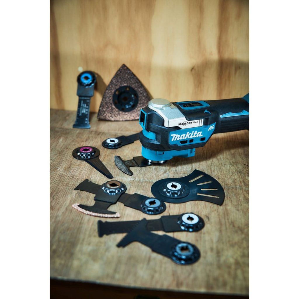 MAKITA Monitoimikone LXT. Kuvassa Monitoimikone LXT sekä erilaisia upotusteriä ja hiomateriä.