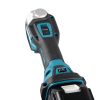 MAKITA Monitoimikone LXT. Lähikuvassa Monitoimikone LXT:n nopeudensäädin ja käynnistyskytkin.