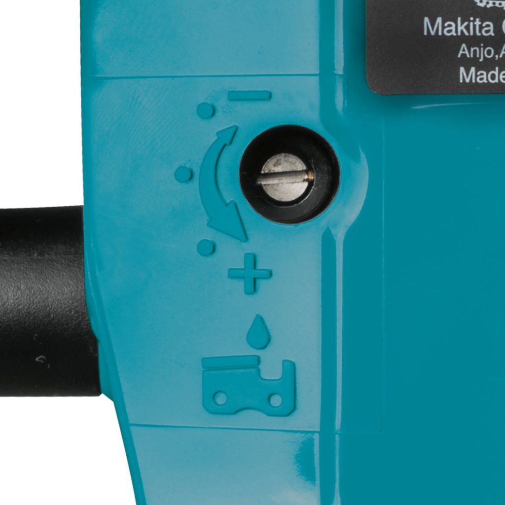 MAKITA Ketjusaha LXT. Lähikuvassa Ketjusaha LXT:n öljymäärän säädin.