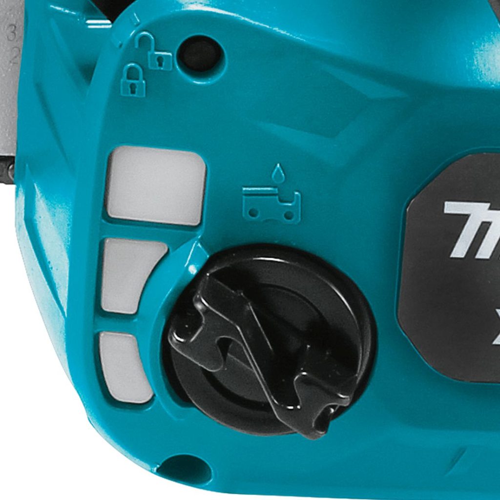 MAKITA Ketjusaha LXT. Lähikuvassa Ketjusaha LXT:n öljysäiliön tulppa.