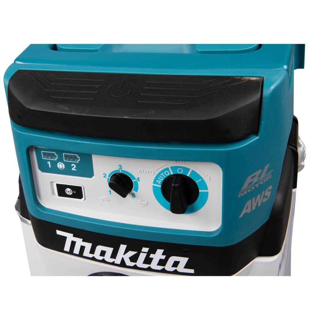 MAKITA Kuivaimuri LXT. Lähikuvassa Kuivaimuri LXT:n virta- ja käyttökytkimet.