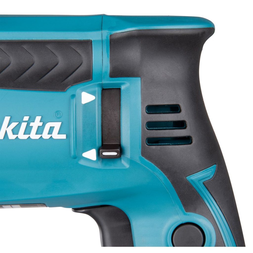 MAKITA Poravasara. Lähikuvassa poravasaran suunnanvaihtokytkin.