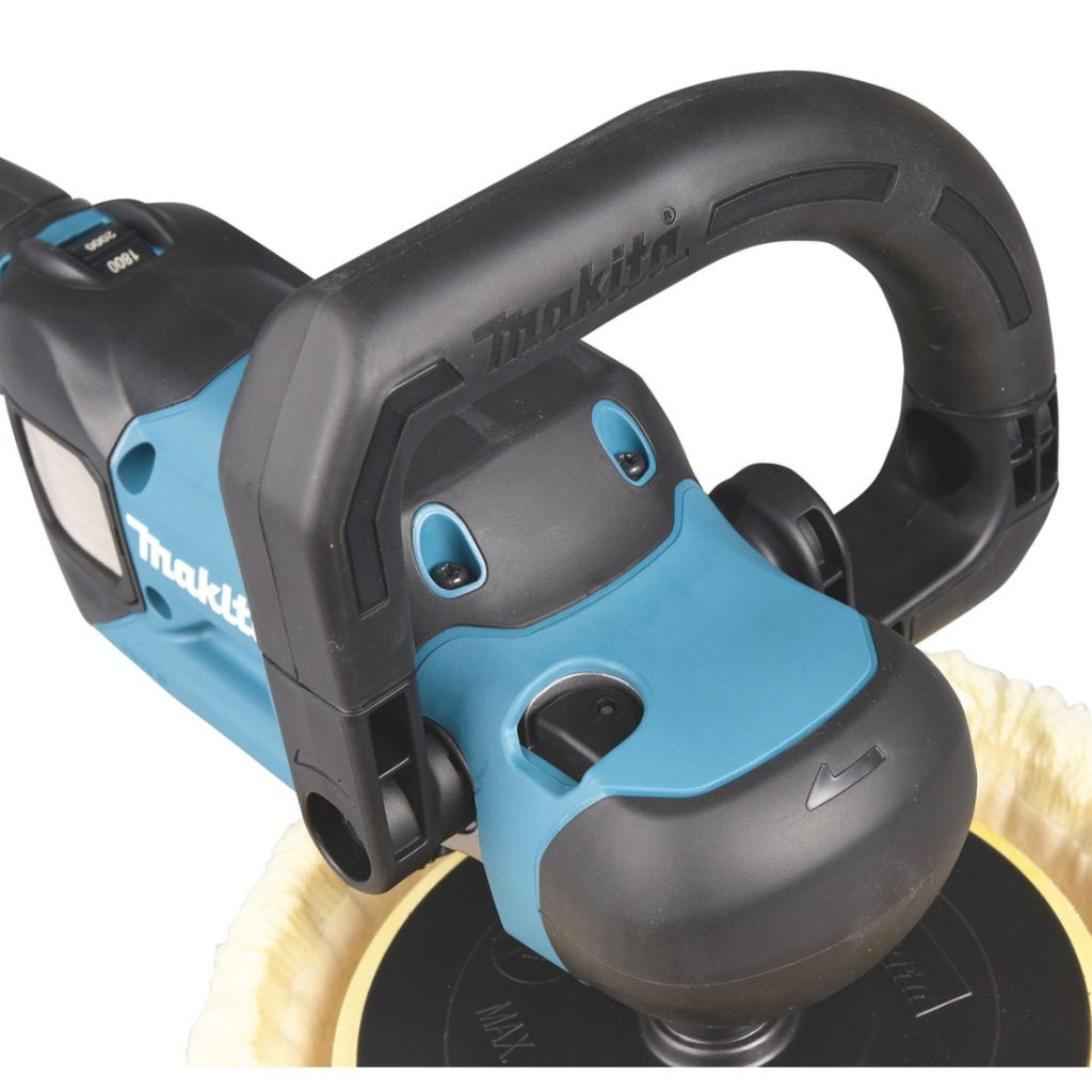MAKITA Kiillotuskone XGT. Lähikuvassa Kiillotuskone XGT:n etukahva vasemmalta etuyläviistosta.