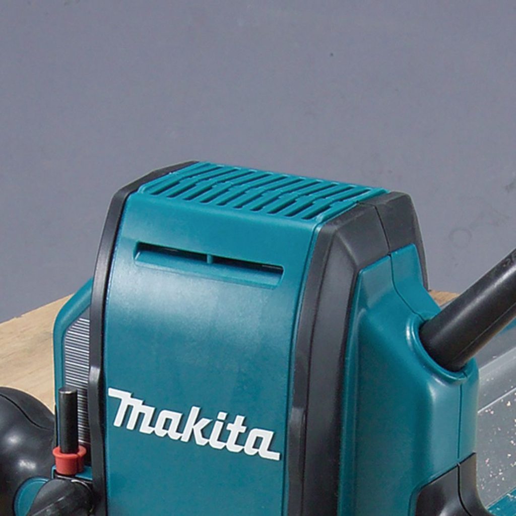 MAKITA Yläjyrsin. Lähikuvassa Yläjyrsimen moottorin tuuletusaukot.