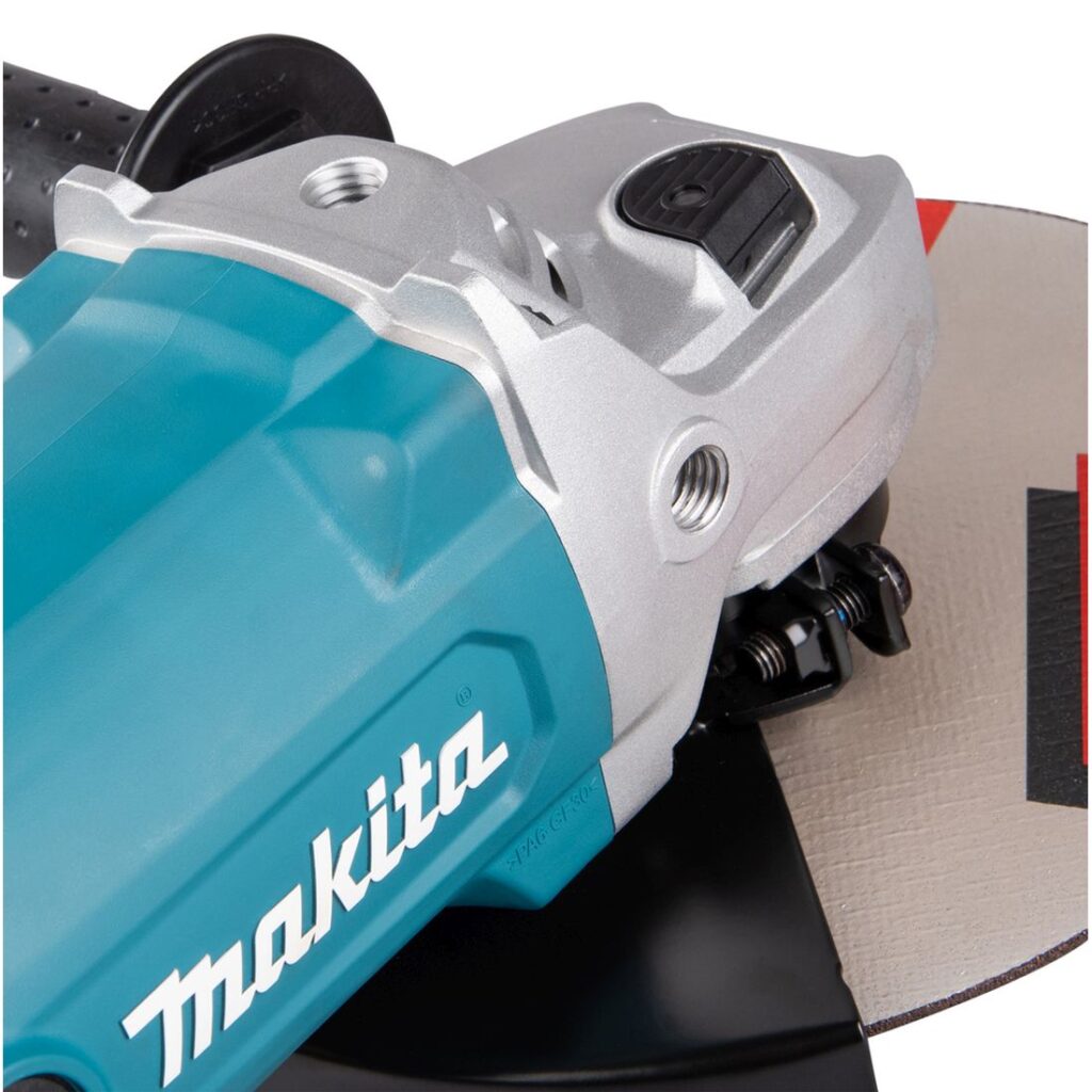 MAKITA Kulmahiomakone GA9090N1. Lähikuvassa Kulmahiomakone GA9090N1:n pölysuoja.