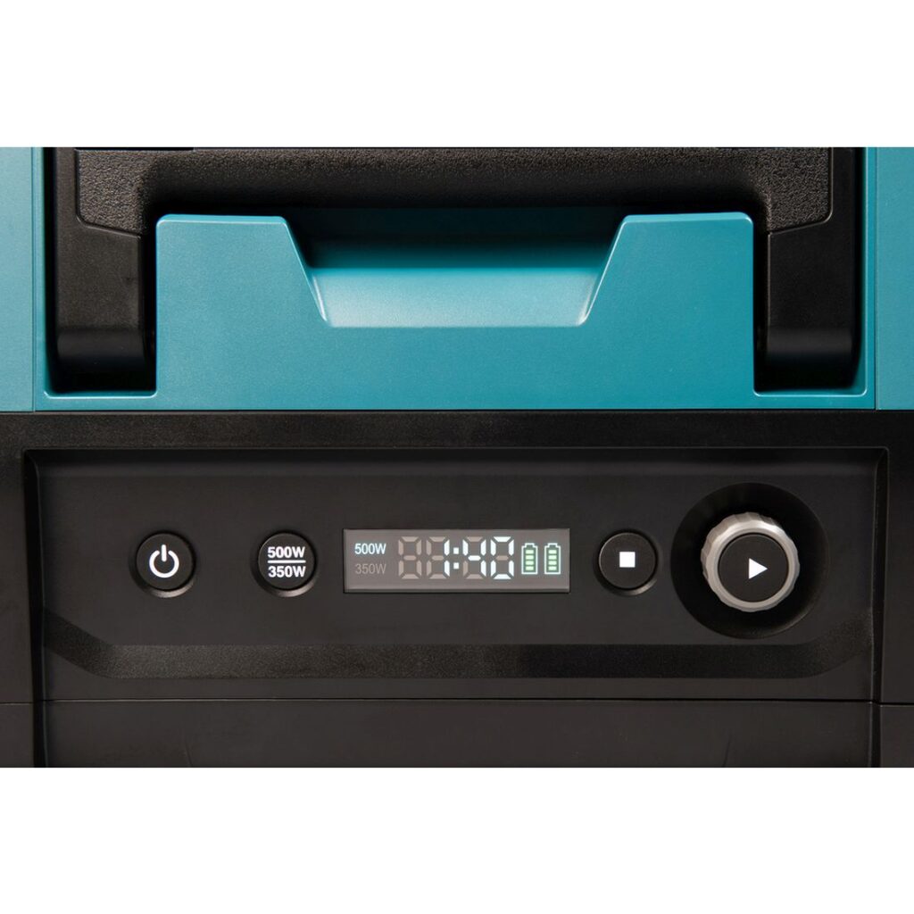 MAKITA Mikroaaltouuni XGT. Lähikuvassa Mikroaaltouuni XGT:n käyttöpainikkeet ja kantokahva ylhäältäpäin.