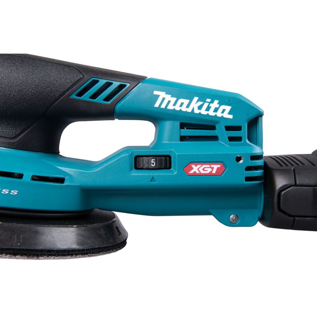 MAKITA Epäkeskohiomakone XGT ® BO004CG. Lähikuvassa epäkeskohiomakone nopeudensäädin sivustapäin.